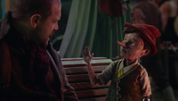 6x12 Robert rencontre Pinocchio marionnette pantin de bois île des plaisirs.png