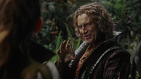 5x04 Rumplestiltskin sable d'Avalon fiole main sourire Reine Guenièvre dos