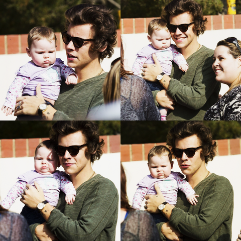 File:Harry holding a baby.png