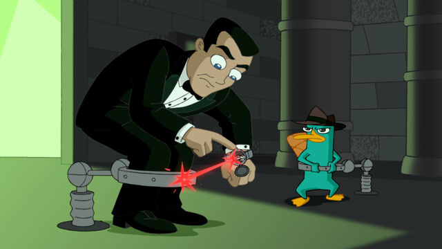 File:Using his laser watch.jpg