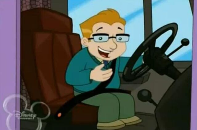 File:Dennis at the wheel.jpg