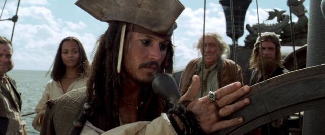 File:CotBPJacklovinglytouchesBlackPearlWheel.jpg