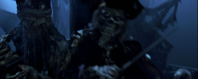 File:CotBPCursedcrewplayingaccordionandviolin.jpg