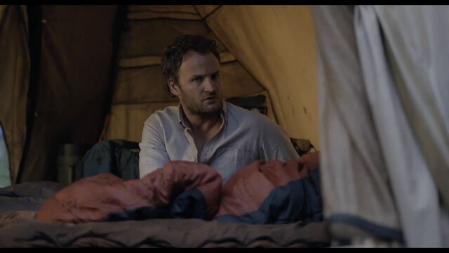 File:Malcolm wakes Ellie.jpg