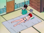 Nabiki sacando fotos a Ranma.png