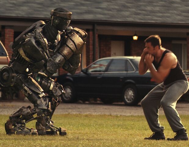 File:Hugh-Jackman-with-star-robot-Atom-in-Real-Steel.jpg