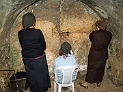 Women praying in the Western Wall tunnels by David Shankbone