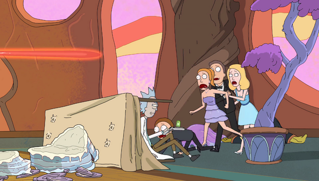 File:S2e10 fam hide behind table.png