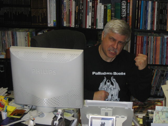 File:Kevin at desk.jpg