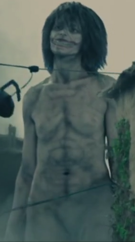 File:Smiling Titan live-action.png
