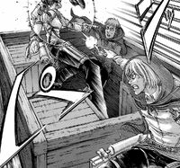 Armin kills Jean's attacker.jpg