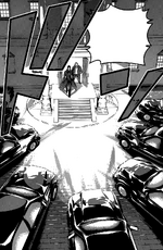 Azami surrounded by cars