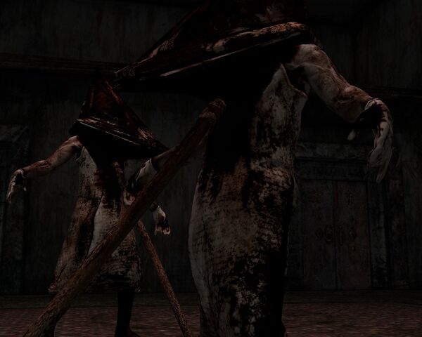 File:Pyramid Head Duo Defeated.jpg