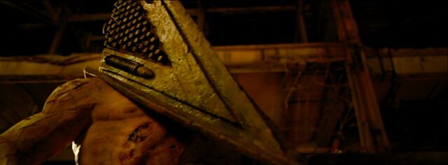 File:Red Pyramid, as he stops Missionary from killing Heather.jpg