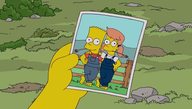 File:Bart holds photo of Mary and him.jpg