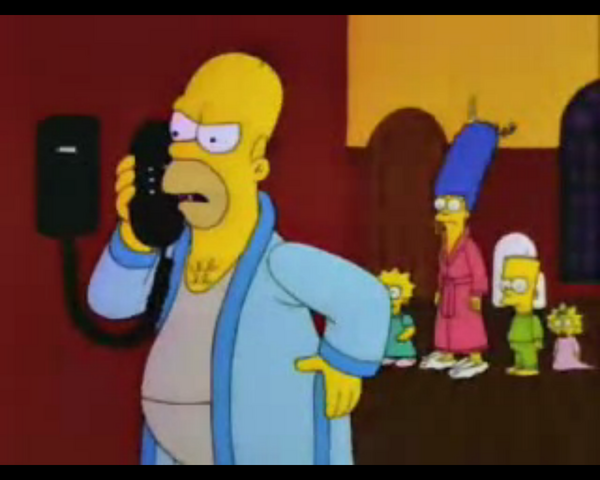 File:AnOutragedHomerOnThePhoneToTheRealtor.png