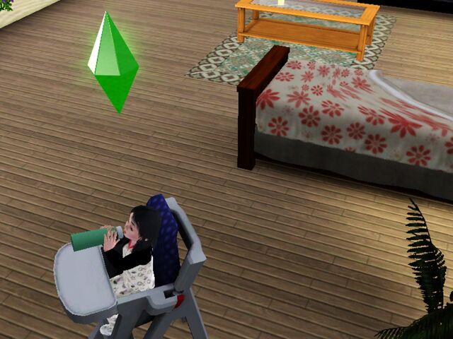File:Toddler feeding.jpg