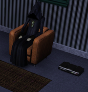 Grim reaper watching TV