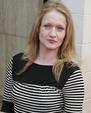 16 (Paula Malcomson)