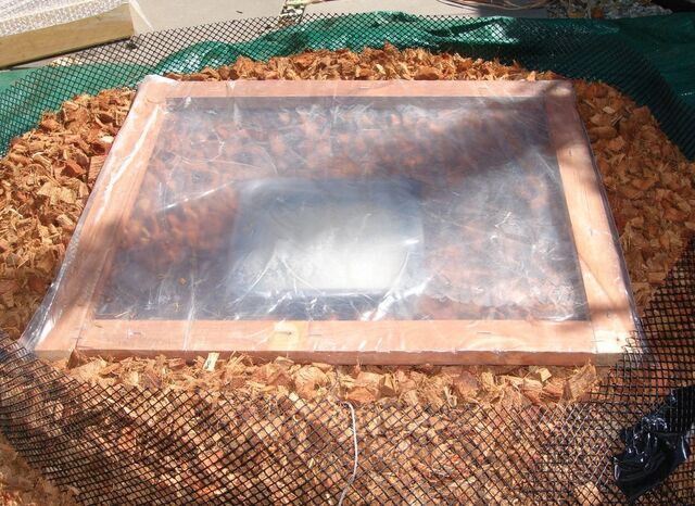 File:Solar Nest with plastic wrap top.jpg