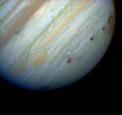 Jupiter showing SL9 impact sites