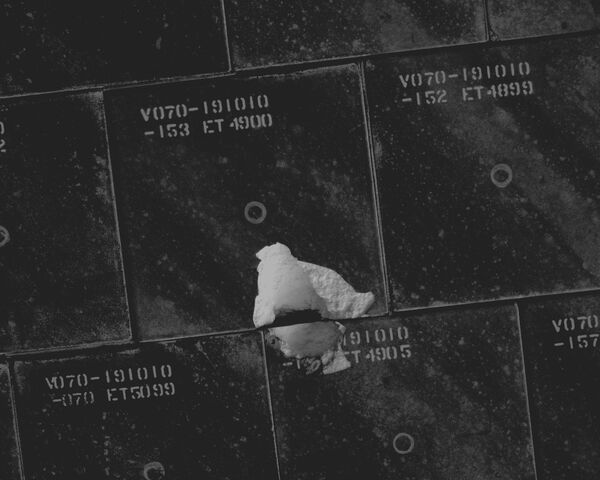 File:Damaged TPS Tiles of Endeavour (NASA S118-E-06229).jpg