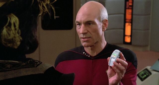 File:Picard Q phaser.jpg