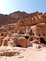 6757840-tombs-in-petra--nabataeans-capital-city-al-khazneh--jordan-made-by-digging-a-holes-in-the-rocks-roma