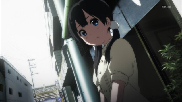 File:Tamako looking back.jpg