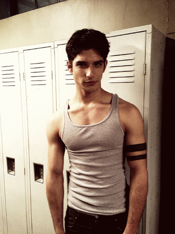 File:Teen Wolf Season 3 Behind the Scenes Tyler Posey Lockers with Tattoo.png