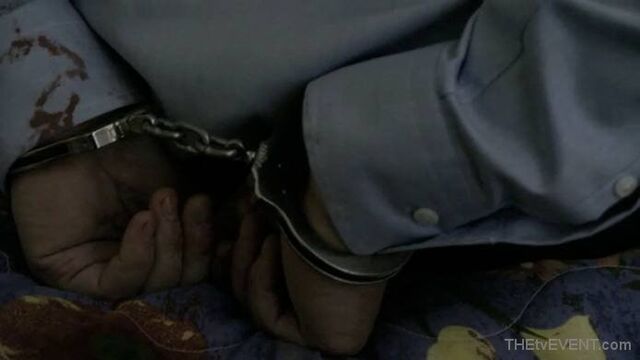File:1.06-CarterInCuffs.jpg