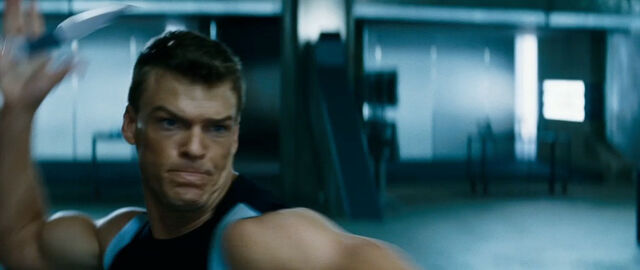 File:The-hunger-games-catching-fire-trailer-screenshot-gloss-training.jpg
