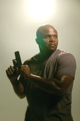 Datei:The-Walking-Dead-T-Dog-K.U..jpg