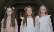 The-woman-in-black-little-girls