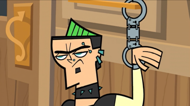 File:DuncanHandcuffed.png