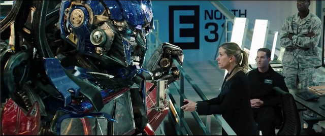 File:Dotm-optimusprime&mearing-film-1.png