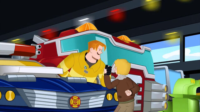 File:OneForTheAges arm wrestling a kid.jpg