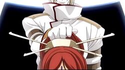 Cain holds Lilith's head