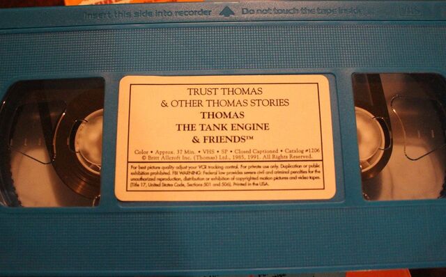 File:TrustThomas1995BlueTape.jpg