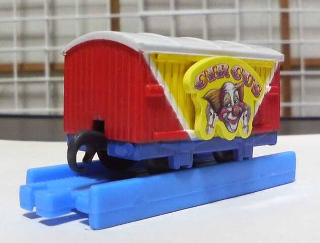 File:CapsulePlarailRedAndYellowCircusVan.jpg