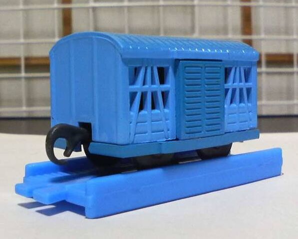 File:Wind-upBlueCattleTruck.jpg