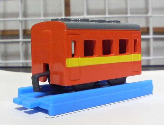 File:Wind-upOrangeCoach.jpg