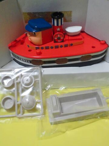 File:JapaneseTenCentsHeadTurningBankboxwithbargeandparts.jpg