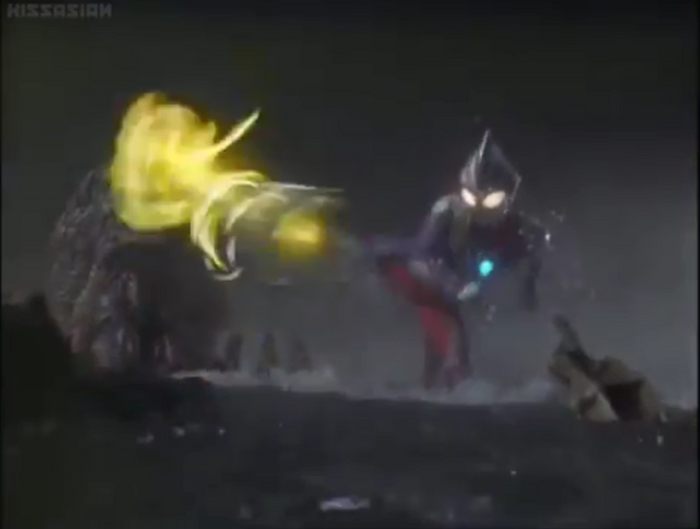File:Tiga kicks Gatanothor.png