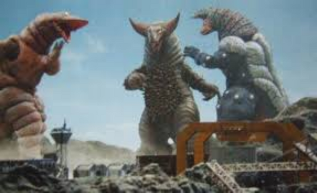 File:Gomora vs Golza & Telesdon.png