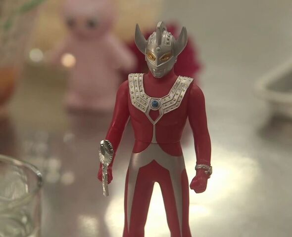 File:Taro holding a spoon.jpg