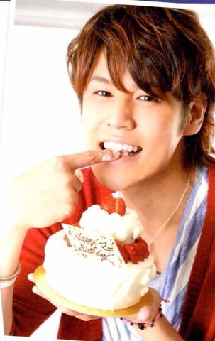 File:Mamoru holds a birthday cake.jpg