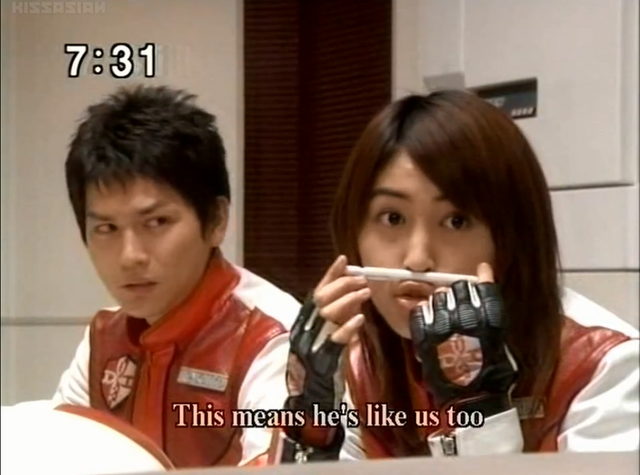 File:Mizuki places a pen on her lip.png