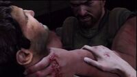 Draza attempts to strangle Nate.jpg
