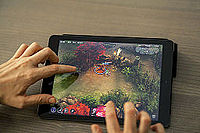 Vainglory - Koshka attacking a jungle monster